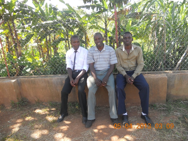 Fred Kabenge PCU Coordinator With James and John